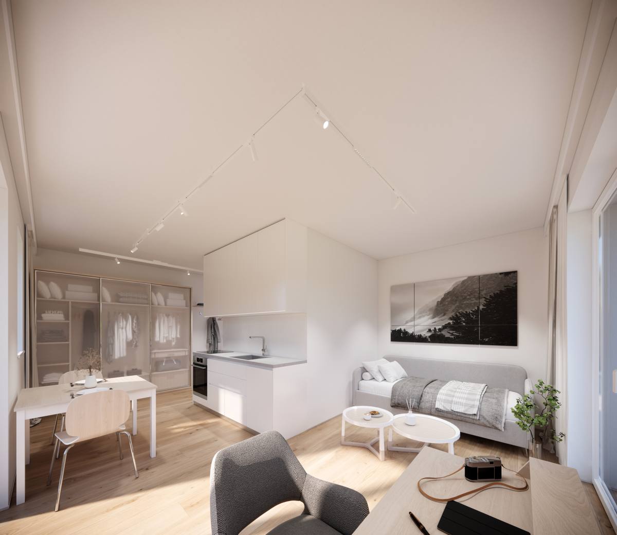 Apartment mit Küchenzeile, Esstisch und Sofa